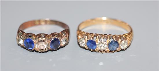 An early 20th century 18ct. gold sapphire and diamond five stone half hoop ring and a 9ct gold, paste and doublet ring.